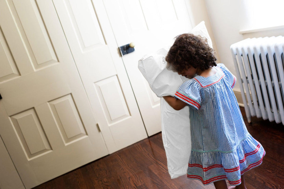 Girl Holding Pillow Color White Cotton Pillowcases Made in America
