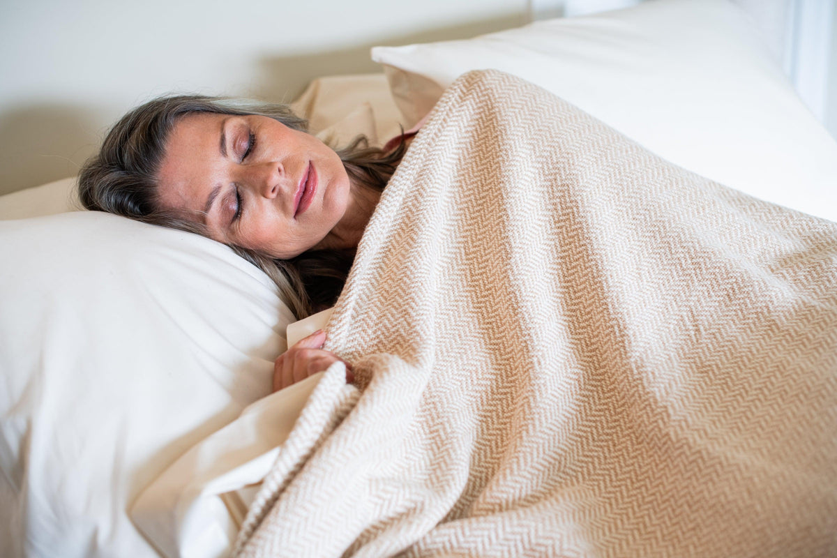 Woman with Folded Blanket American Harvest  Herringbone Weave Cotton Made in USA