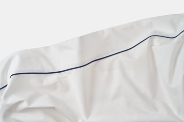Closeup of Hem Bed Sheet Set Navy Blue Classic Piping Design Cotton Made in USA