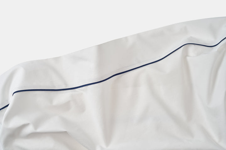 Closeup of Hem Bed Sheet Set Navy Blue Classic Piping Design Cotton Made in USA