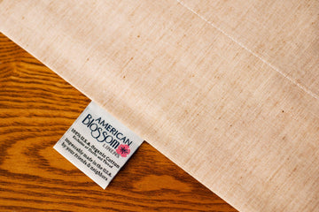 Organic Pillowcase showing the American Blossom Linens Pillowcase Tag.