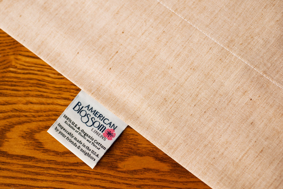 Organic Cotton Flat Sheet showing American Blossom Linens Label.
