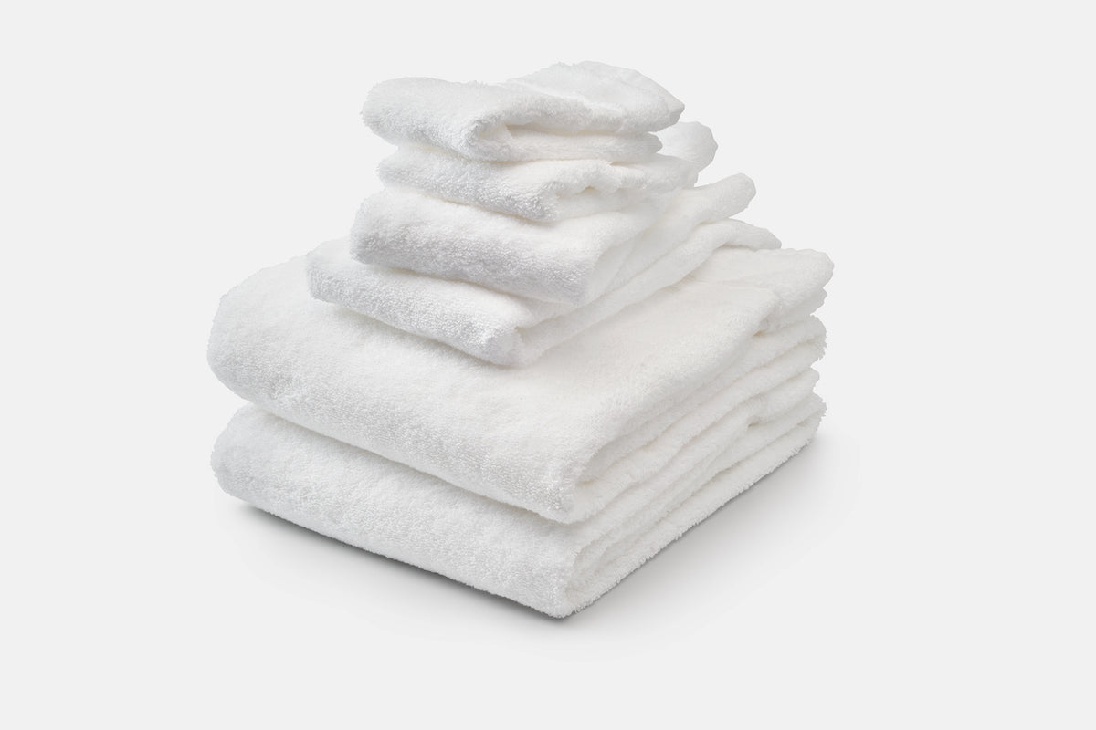 Stack of Towel Set Color White Bath Towel Set Ethically Made Luxury Cotton Made in USA